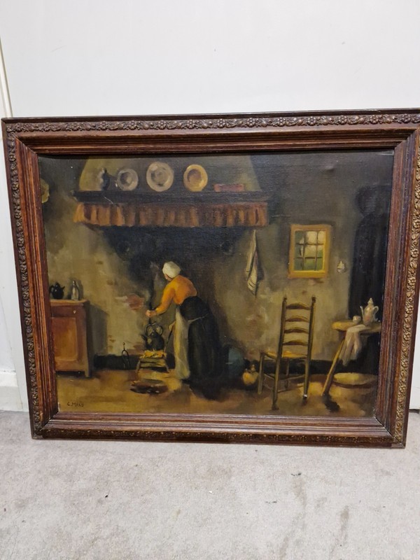 An oil painting depicts a woman working by a fireplace W67cn*L60cm signed