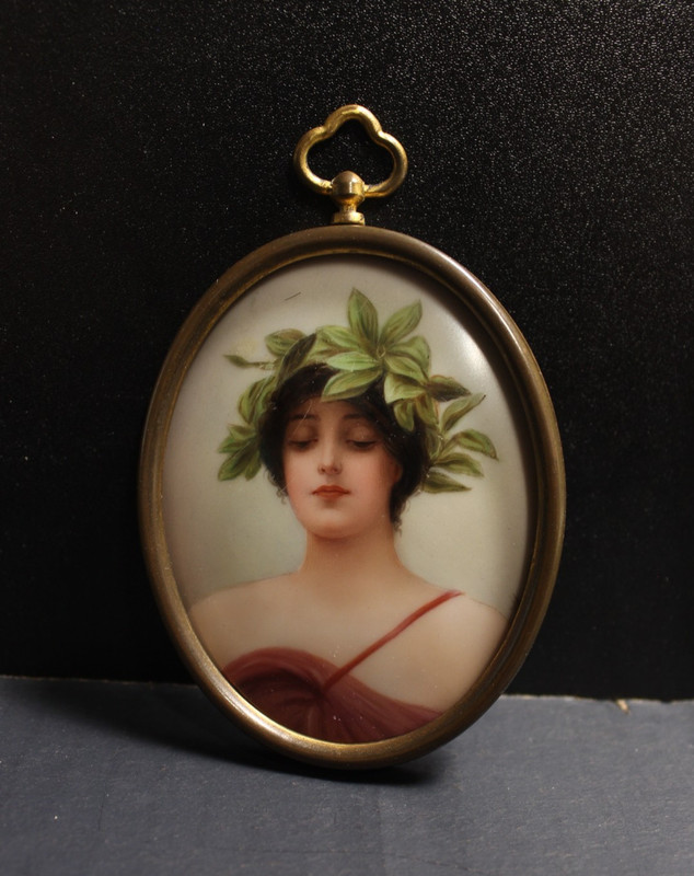 Antique miniature portrait of woman on porcelain in frame
