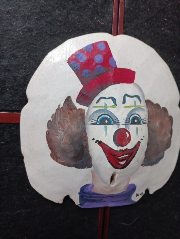 Hand Painted Clown On Sand Dollar Signed by Unknown Artist gallery