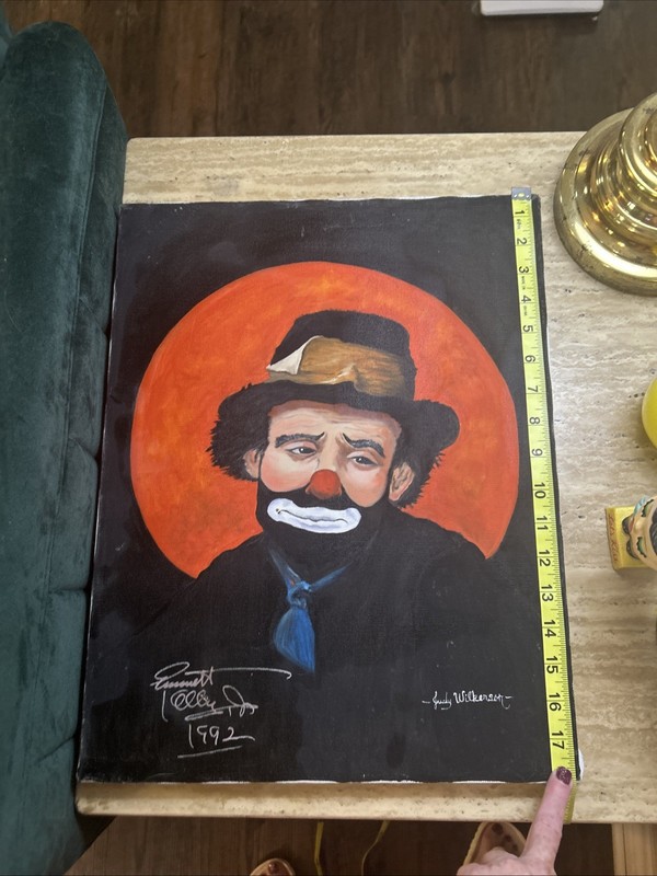 A 1992 painting of a sad clown, signed by Judy Williamson and «Emmitt Kelly Jr”