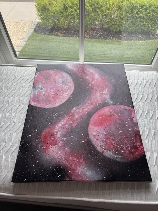 A Custom Spray Painted Picture Of Outer Space On A 16×20 Canvas