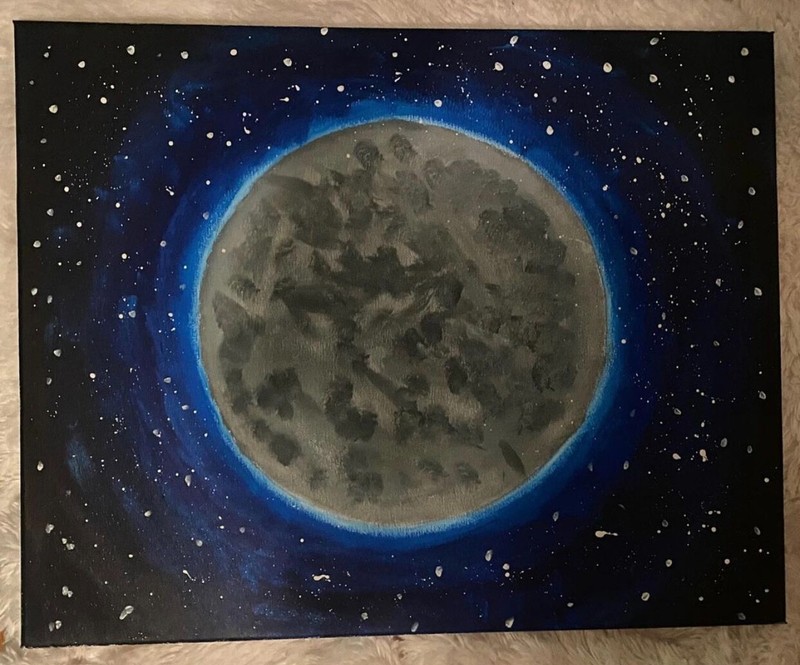 The full moon phase, pop of different colors of blues, grays, and black. 