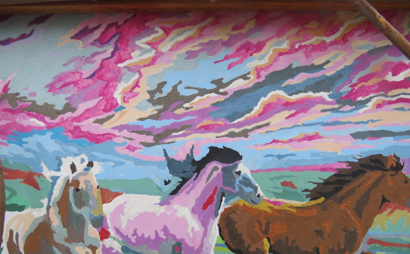 UNIQUE RUSTIC TWIG FRAMED PAINTING ON CARDBOARD OF RUNNING HORSES gallery