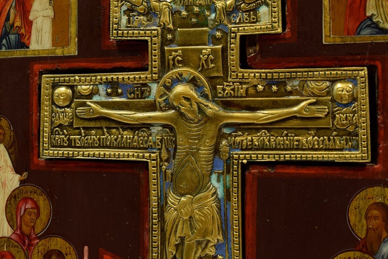 19th c. Russian icon on a wooden panel depicting religious scenes with a cross. gallery