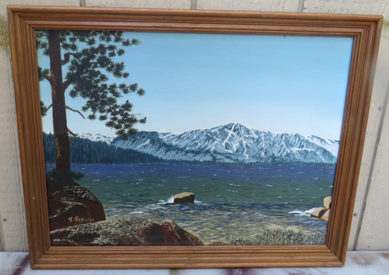 FRAMED OIL ON BOARD LAKESIDE OR COASTAL SCENE WITH MOUNTAINS PAINTING