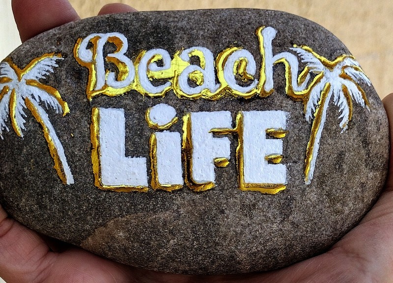 Gorgeous Gold & White "BEACH LIFE" painted river rock by jade. Celebrate Summer gallery