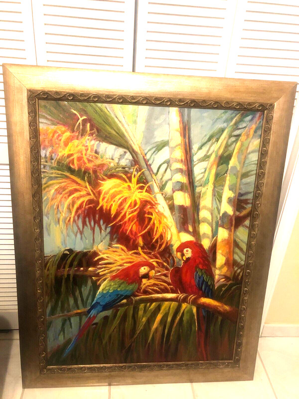 framed oil canvas painting of two multi color parrots in jungle 48in by 37in