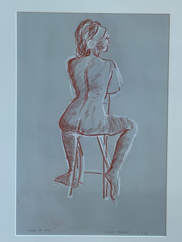 CHUCK GIBBON ALBUQUERQUE N.M. SEATED WOMAN DRAWING ON PAPER 21.5″ X 16″ 2009
