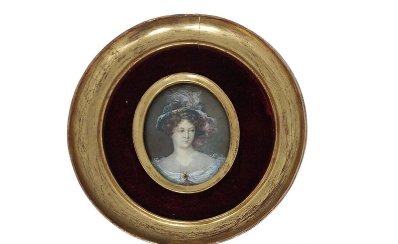 Antique important miniature oval lady with a hat gallery