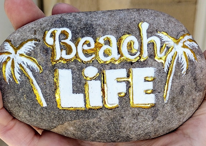 Gorgeous Gold & White «BEACH LIFE» painted river rock by jade. Celebrate Summer