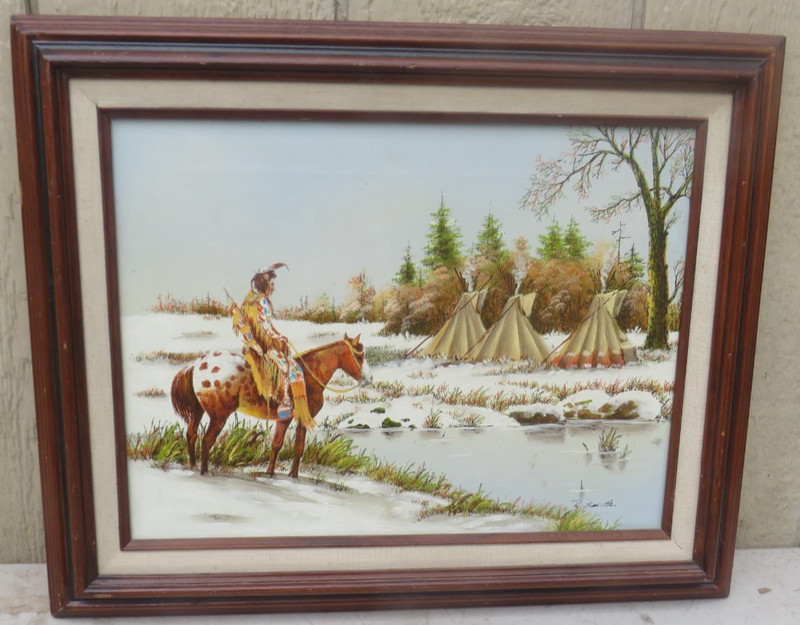 FRAMED WESTERN-THEMED NATIVE AMERICAN FIGURE ON HORSEBACK O/C IN A SNOWY SIGNED