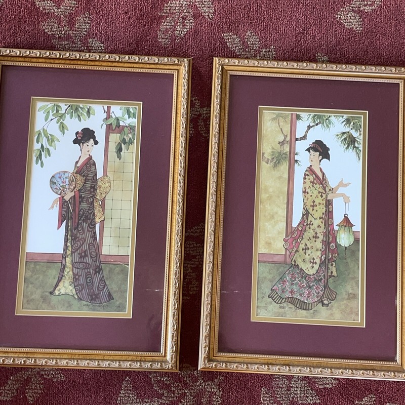 A woman walking in the garden under the tree/fan