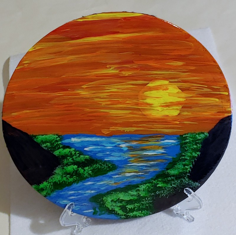 SIGNED- Hand Painted on 7 1/4in Dia Metal Disc W/Stand- SUNSET BY THE RIVER –