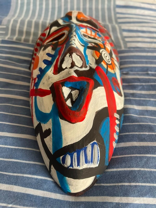 BASQUIAT, DRAWING AND PAINTING ON AN ANCIENT MASK, SEALED AND SIGNED gallery